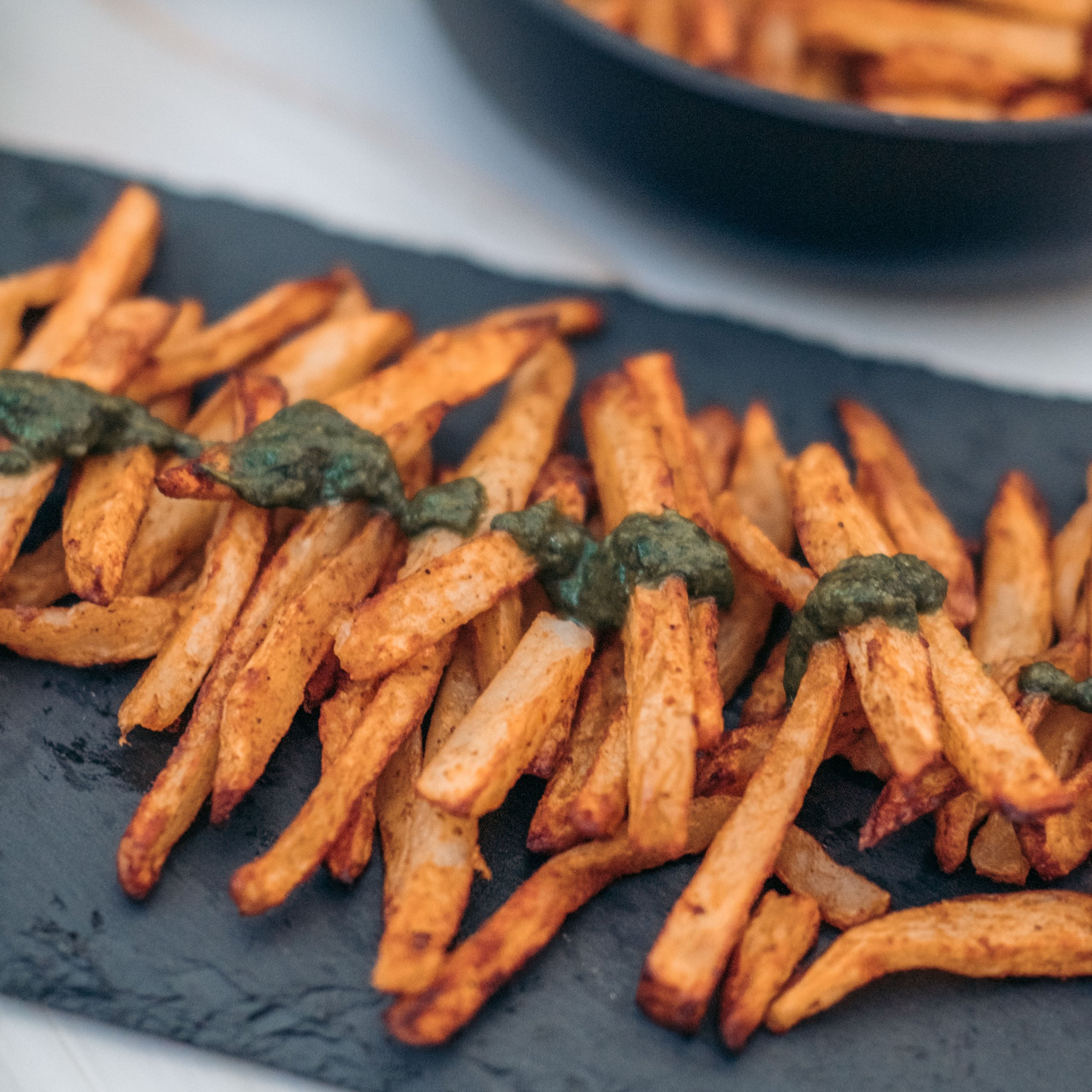 https://www.yuzubakes.com/sites/yuzubakes.com/files/styles/r-sq/public/delicious-chimichurri-fries-served-and-ready.jpg